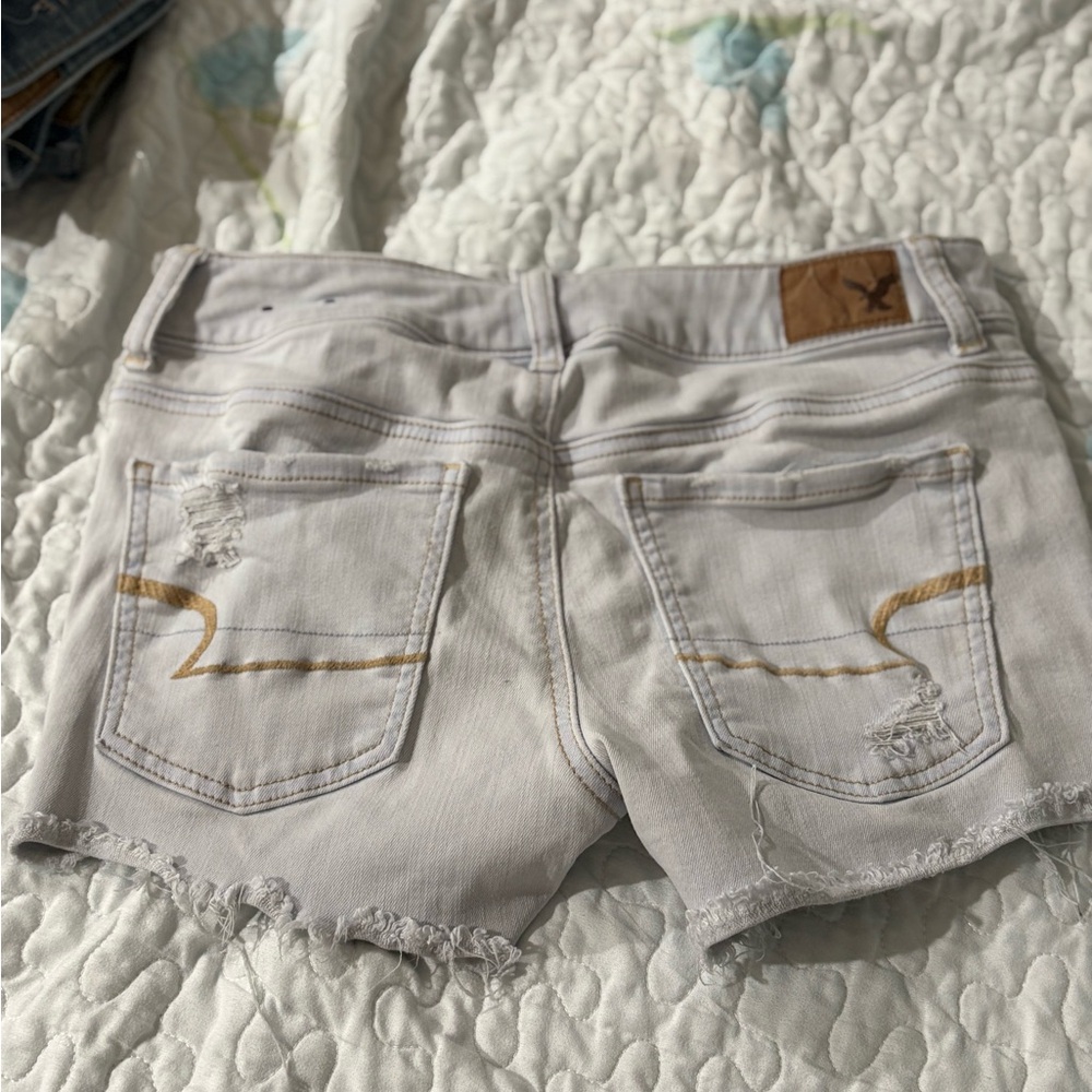 American Eagle Outfitters Women's mid rise distressed shorts